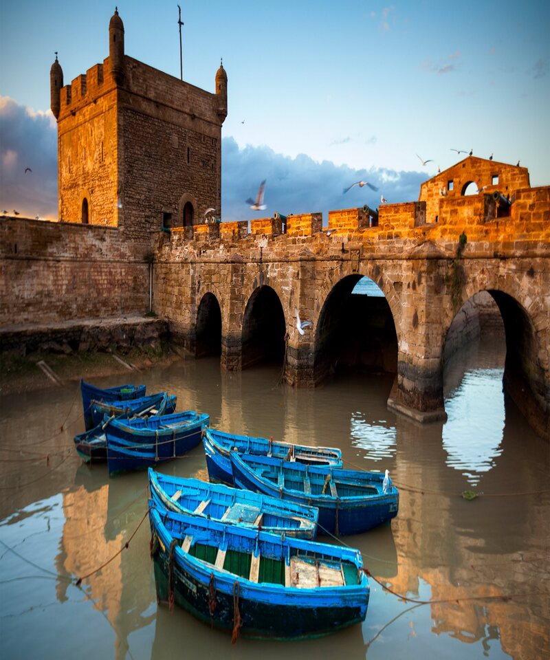 Essaouira city in Morocco, blue boats and water