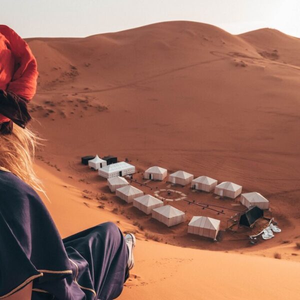 a girl watching a desert camp during 5-day tour from Marrakech to Fes