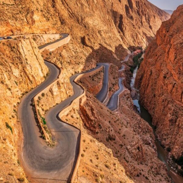 Curvy road in Morocco during our 7-day tour from Marrakech to imperial cities and blue city.