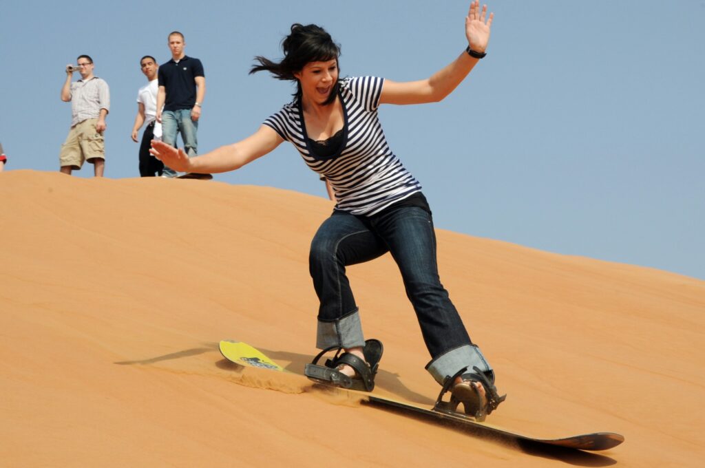 Sandboarding in the Merzouga desert compared to Zagora