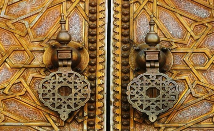 A Moroccan door handles with our 9-day tour from Fes to Marrakech and the desert.