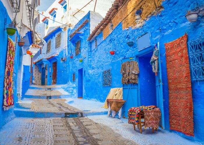 A blue street in Morocco during the 3-day tour from Marrakech to Chefchaouen via imperial cities.